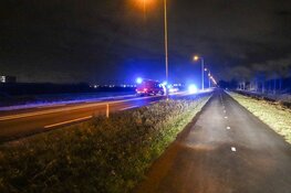 Omstanders redden duo uit te water geraakte auto