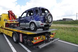Aanrijding tussen drie auto's en een aanhanger